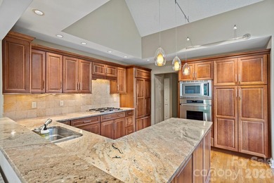 PRIME LOCATION! Stunning villa with level driveway/entry on Kenmure Country Club in North Carolina - for sale on GolfHomes.com, golf home, golf lot