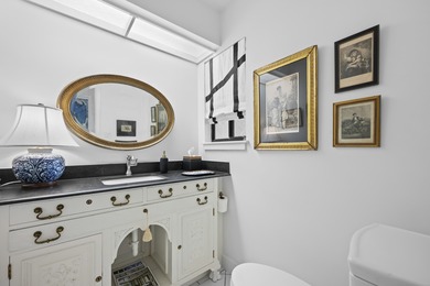 Spacious lakefront golf villa with 3 bedrooms, 2.5 bathrooms on Mariner Sands Country Club in Florida - for sale on GolfHomes.com, golf home, golf lot