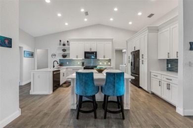 Welcome to this beautifully updated and fully turnkey 3-bedroom on Pinemoor West Golf Club in Florida - for sale on GolfHomes.com, golf home, golf lot