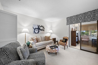 Spacious lakefront golf villa with 3 bedrooms, 2.5 bathrooms on Mariner Sands Country Club in Florida - for sale on GolfHomes.com, golf home, golf lot