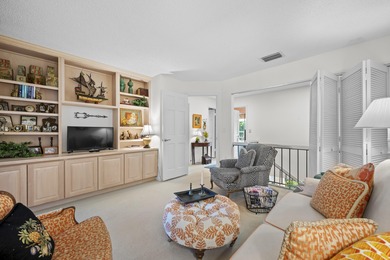 Spacious lakefront golf villa with 3 bedrooms, 2.5 bathrooms on Mariner Sands Country Club in Florida - for sale on GolfHomes.com, golf home, golf lot