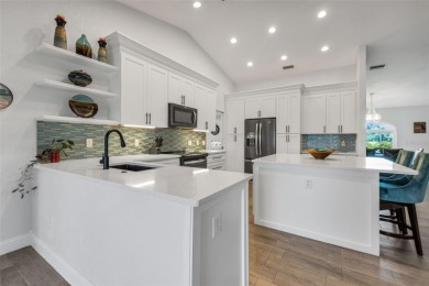 Welcome to this beautifully updated and fully turnkey 3-bedroom on Pinemoor West Golf Club in Florida - for sale on GolfHomes.com, golf home, golf lot