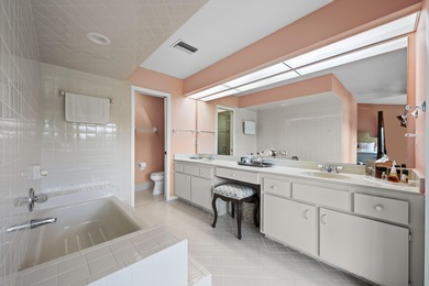 Spacious lakefront golf villa with 3 bedrooms, 2.5 bathrooms on Mariner Sands Country Club in Florida - for sale on GolfHomes.com, golf home, golf lot