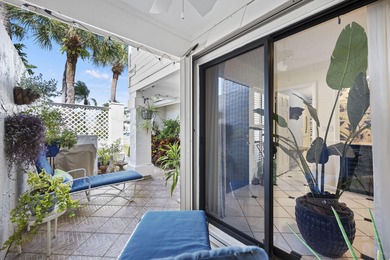 Spacious lakefront golf villa with 3 bedrooms, 2.5 bathrooms on Mariner Sands Country Club in Florida - for sale on GolfHomes.com, golf home, golf lot