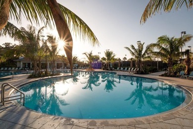 Spacious lakefront golf villa with 3 bedrooms, 2.5 bathrooms on Mariner Sands Country Club in Florida - for sale on GolfHomes.com, golf home, golf lot