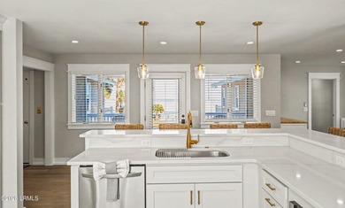 This impeccably redesigned oceanfront home blends luxury and on Ocean Point Golf Links in South Carolina - for sale on GolfHomes.com, golf home, golf lot