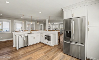 This impeccably redesigned oceanfront home blends luxury and on Ocean Point Golf Links in South Carolina - for sale on GolfHomes.com, golf home, golf lot