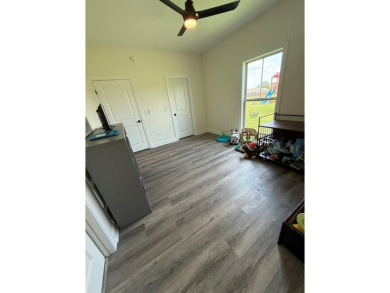 Gorgeous like-new home, built in 2024, offering 4 bedrooms, 3 on Headland Country Club in Alabama - for sale on GolfHomes.com, golf home, golf lot