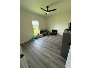 Gorgeous like-new home, built in 2024, offering 4 bedrooms, 3 on Headland Country Club in Alabama - for sale on GolfHomes.com, golf home, golf lot
