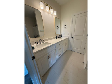 Gorgeous like-new home, built in 2024, offering 4 bedrooms, 3 on Headland Country Club in Alabama - for sale on GolfHomes.com, golf home, golf lot