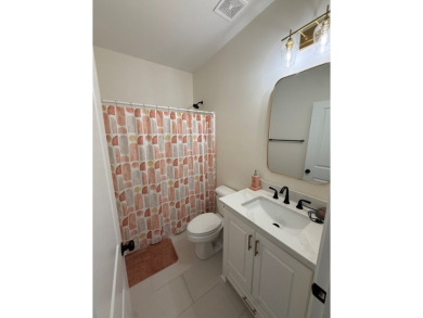 Gorgeous like-new home, built in 2024, offering 4 bedrooms, 3 on Headland Country Club in Alabama - for sale on GolfHomes.com, golf home, golf lot