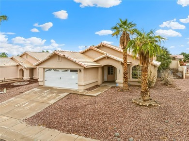 This charming 3 bedroom 2 bathroom home sits on a spacious on Desert Lakes Golf Course in Arizona - for sale on GolfHomes.com, golf home, golf lot