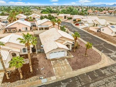This charming 3 bedroom 2 bathroom home sits on a spacious on Desert Lakes Golf Course in Arizona - for sale on GolfHomes.com, golf home, golf lot