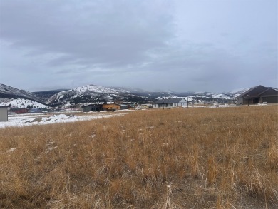 This flat, spacious lot is ready for you to create your perfect on The Old Works Golf Course in Montana - for sale on GolfHomes.com, golf home, golf lot