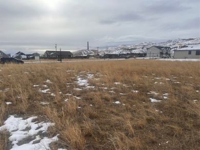 This flat, spacious lot is ready for you to create your perfect on The Old Works Golf Course in Montana - for sale on GolfHomes.com, golf home, golf lot