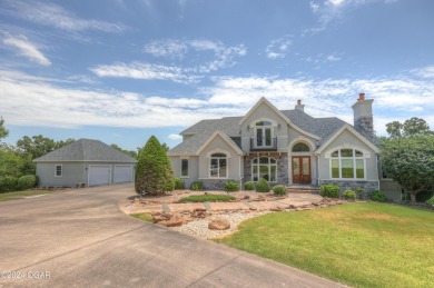 Welcome home to 2401 Sandstone Way! Located in desired Loma on The Bald Eagle Course At Eagle Creek Golf Club in Missouri - for sale on GolfHomes.com, golf home, golf lot