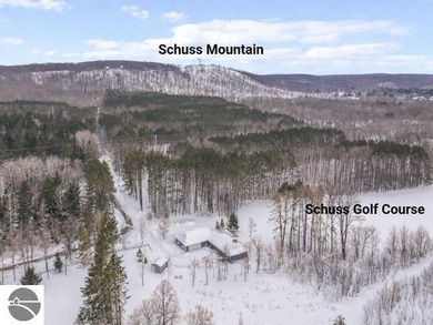 Positioned on corner parcel, this home blends comfort & casual on  in Michigan - for sale on GolfHomes.com, golf home, golf lot