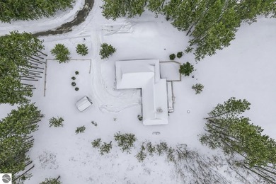 Positioned on corner parcel, this home blends comfort & casual on  in Michigan - for sale on GolfHomes.com, golf home, golf lot