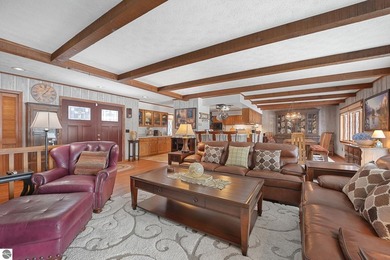 Positioned on corner parcel, this home blends comfort & casual on  in Michigan - for sale on GolfHomes.com, golf home, golf lot