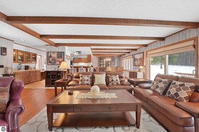 Positioned on corner parcel, this home blends comfort & casual on  in Michigan - for sale on GolfHomes.com, golf home, golf lot