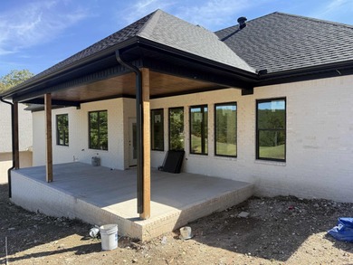 Welcome to your dream home overlooking the 8th tee box of on Granada Golf Course in Arkansas - for sale on GolfHomes.com, golf home, golf lot