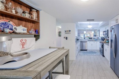 Completely remodeled ground floor end unit 2/2 with den and one on Kelly Greens Golf and Country Club in Florida - for sale on GolfHomes.com, golf home, golf lot