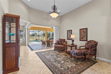 Perfectly positioned along the golf course, this elegant pool on Venetian Golf and River Club in Florida - for sale on GolfHomes.com, golf home, golf lot