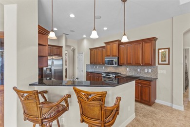 Perfectly positioned along the golf course, this elegant pool on Venetian Golf and River Club in Florida - for sale on GolfHomes.com, golf home, golf lot