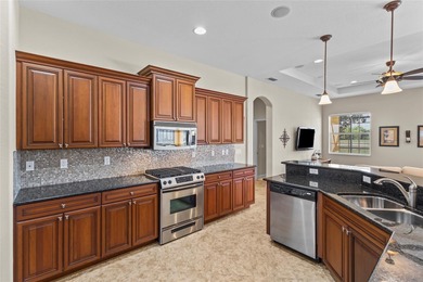 Perfectly positioned along the golf course, this elegant pool on Venetian Golf and River Club in Florida - for sale on GolfHomes.com, golf home, golf lot