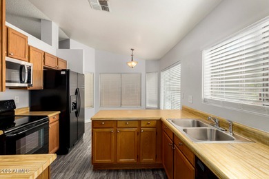 Golf Course 3 bedroom, 2 bath home with bonus room in Peoria! on Country Meadows Golf Club in Arizona - for sale on GolfHomes.com, golf home, golf lot