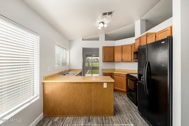 Golf Course 3 bedroom, 2 bath home with bonus room in Peoria! on Country Meadows Golf Club in Arizona - for sale on GolfHomes.com, golf home, golf lot