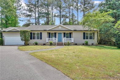 Opportunity doesn't knock-it shows up with curb appeal, fresh on Woodlake Country Club in North Carolina - for sale on GolfHomes.com, golf home, golf lot