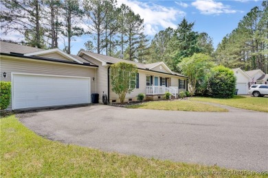 Opportunity doesn't knock-it shows up with curb appeal, fresh on Woodlake Country Club in North Carolina - for sale on GolfHomes.com, golf home, golf lot
