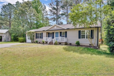 Opportunity doesn't knock-it shows up with curb appeal, fresh on Woodlake Country Club in North Carolina - for sale on GolfHomes.com, golf home, golf lot