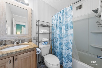 Coastal chic design with really nice kitchen and bath updates on Kiva Dunes Golf Club in Alabama - for sale on GolfHomes.com, golf home, golf lot