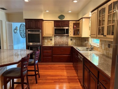 This classic Florida ranch-style home in desirable Bay Hill on Arnold Palmers Bay Hill Club and Lodge  in Florida - for sale on GolfHomes.com, golf home, golf lot