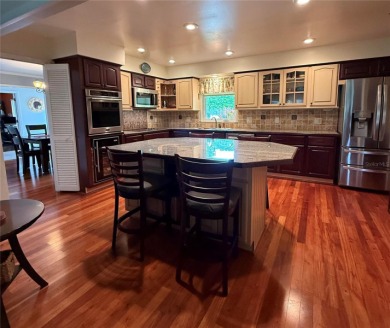 This classic Florida ranch-style home in desirable Bay Hill on Arnold Palmers Bay Hill Club and Lodge  in Florida - for sale on GolfHomes.com, golf home, golf lot