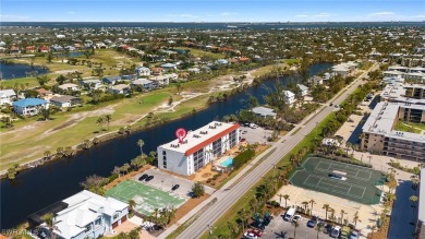 Enjoy the best of island living from this top-floor, end-unit on Beachview Golf Club in Florida - for sale on GolfHomes.com, golf home, golf lot