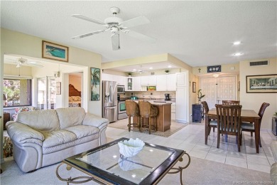 Enjoy the STUNNING view of the green space and pool from this on Martin County Golf Course in Florida - for sale on GolfHomes.com, golf home, golf lot