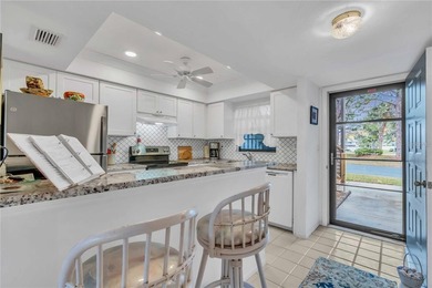 Highly sought after ground floor condo on demand Capri Isles on Capri Isle Golf Club in Florida - for sale on GolfHomes.com, golf home, golf lot