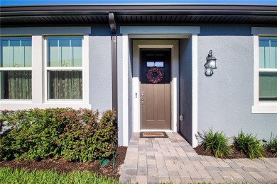 Welcome to this beautiful Topsail floor plan model home located on The Golf Club of Cypress Creek in Florida - for sale on GolfHomes.com, golf home, golf lot