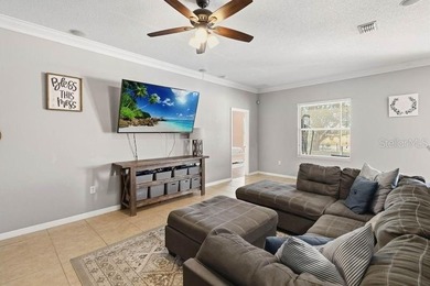 Under contract-accepting backup offers. Welcome home to this on Royal St. Cloud Golf Links in Florida - for sale on GolfHomes.com, golf home, golf lot