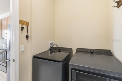 Under contract-accepting backup offers. Welcome home to this on Royal St. Cloud Golf Links in Florida - for sale on GolfHomes.com, golf home, golf lot