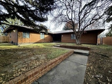 This large, contemporary family residence boasts five bedrooms on Miles City Town and Country Club in Montana - for sale on GolfHomes.com, golf home, golf lot