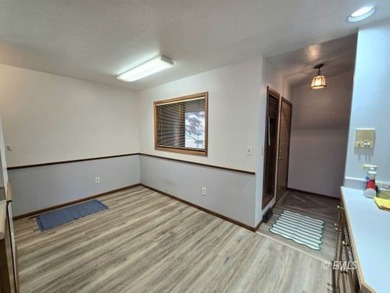 This large, contemporary family residence boasts five bedrooms on Miles City Town and Country Club in Montana - for sale on GolfHomes.com, golf home, golf lot