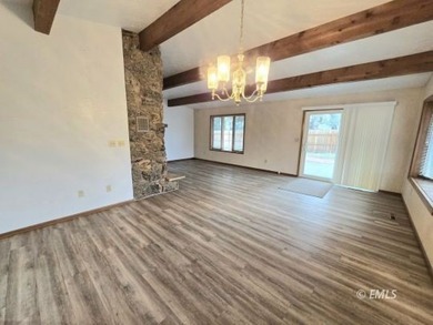 This large, contemporary family residence boasts five bedrooms on Miles City Town and Country Club in Montana - for sale on GolfHomes.com, golf home, golf lot