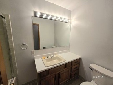 This large, contemporary family residence boasts five bedrooms on Miles City Town and Country Club in Montana - for sale on GolfHomes.com, golf home, golf lot