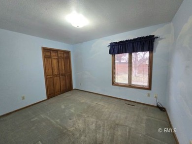 This large, contemporary family residence boasts five bedrooms on Miles City Town and Country Club in Montana - for sale on GolfHomes.com, golf home, golf lot