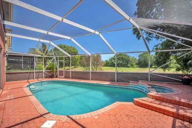 Elegant two-story residence located in the highly sought-after on Palm-Aire Country Club and Resort - The Oaks in Florida - for sale on GolfHomes.com, golf home, golf lot