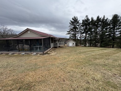 Perfectly positioned on the 9th green and situated on 2+ acres on Skyland Lakes Golf Course in Virginia - for sale on GolfHomes.com, golf home, golf lot